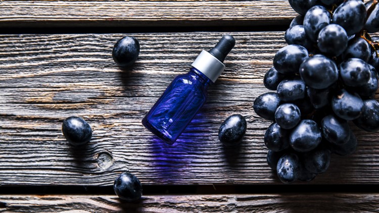 Essential oil with blue grapes